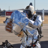 Practice doning Crash Fire Rescue equipment