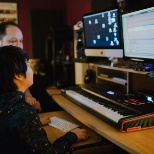 Student and teaching working one-to-one in the music studio.