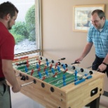 Our cafeteria features a full kitchen plus foosball and ping pong!